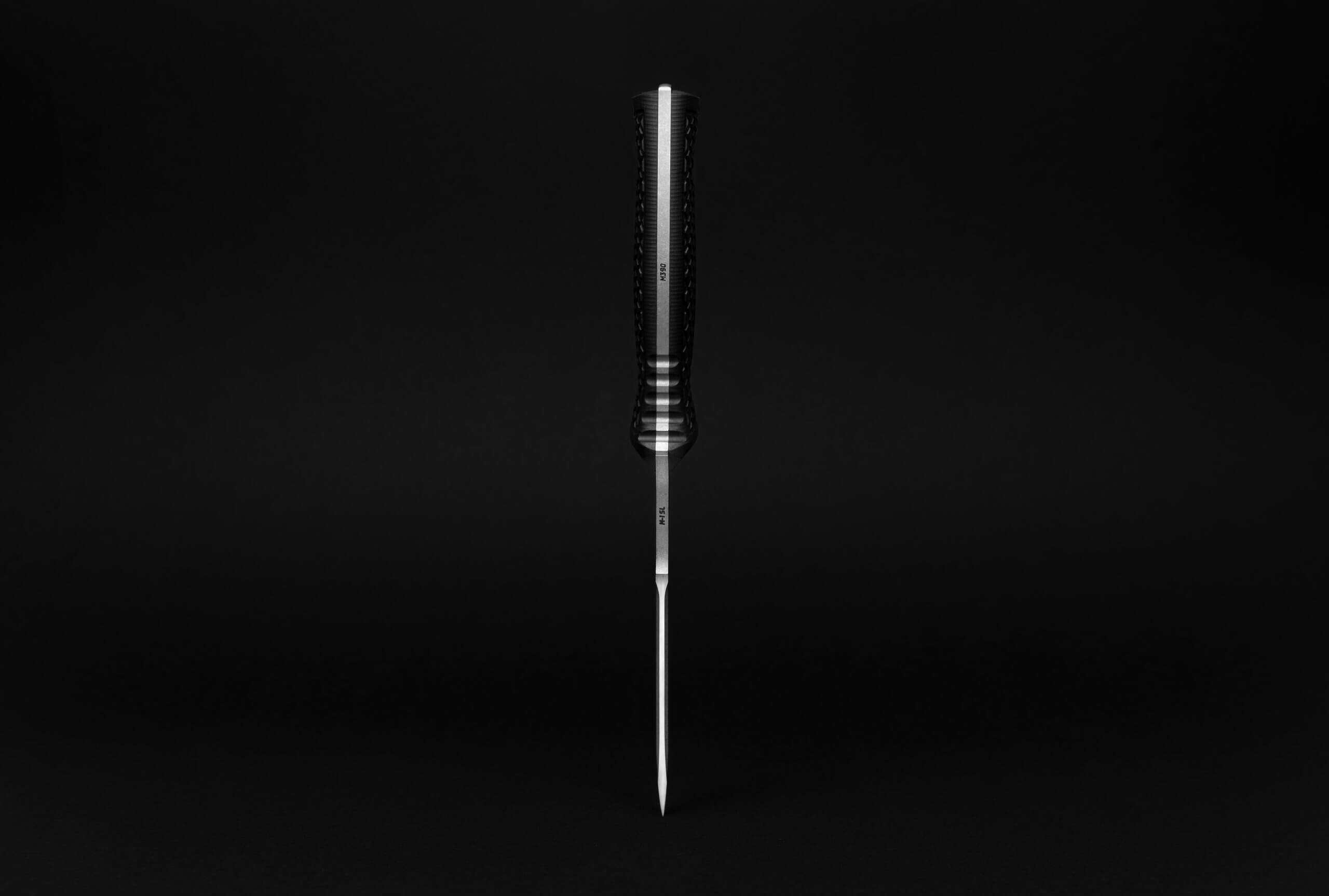 TRC knife detail view 2 showing blade detail and steel finish